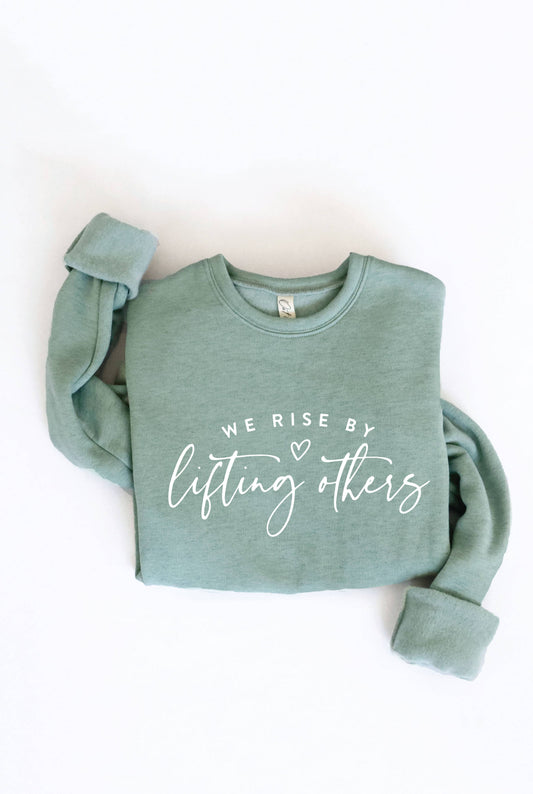 WE RISE BY LIFTING OTHERS  Graphic Sweatshirt